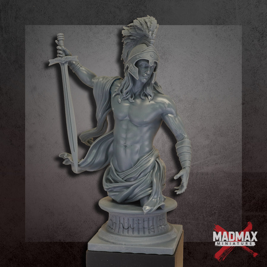 a statue of a man holding a sword a statue of a man holding a sword
