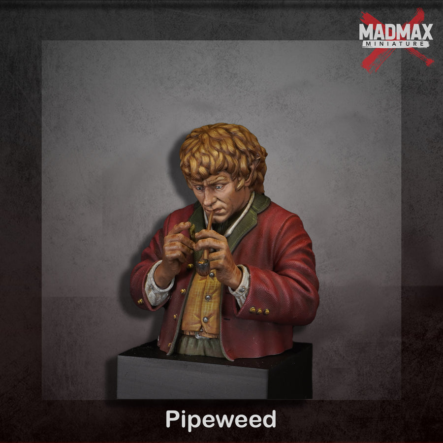 a figurine of a man wearing a red jacket and holding a pipe. a figurine of a man wearing a red jacket and holding a pipe.
