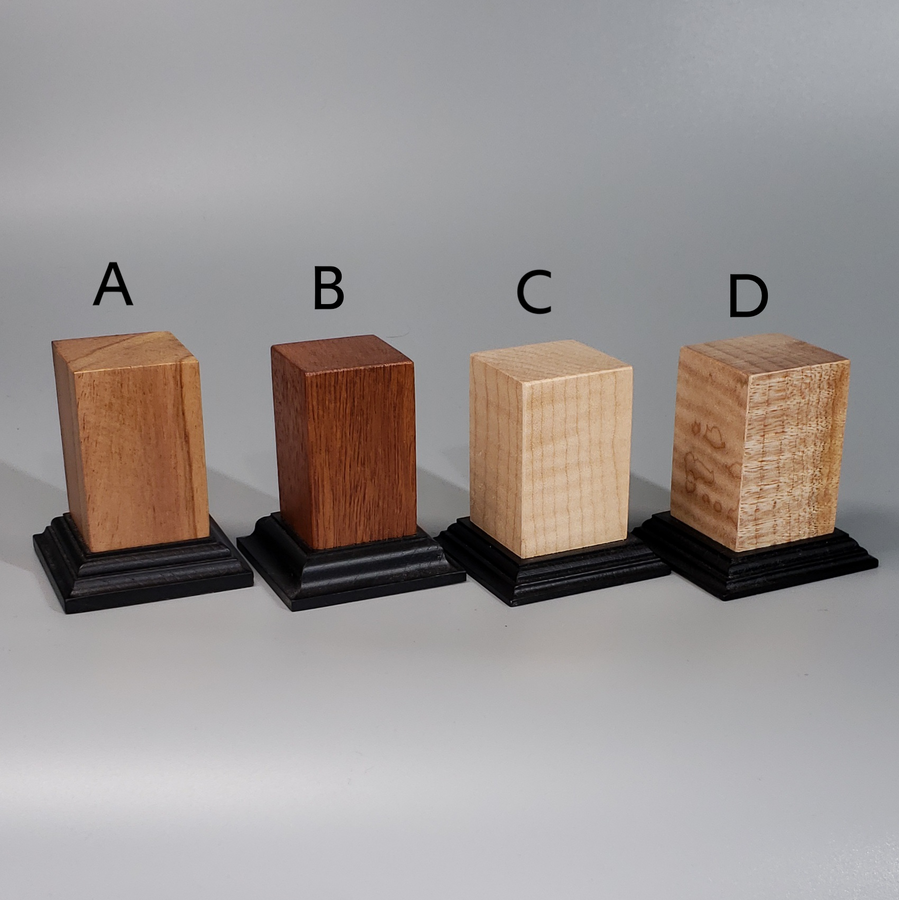 a row of wooden blocks sitting on top of each other a row of wooden blocks sitting on top of each other