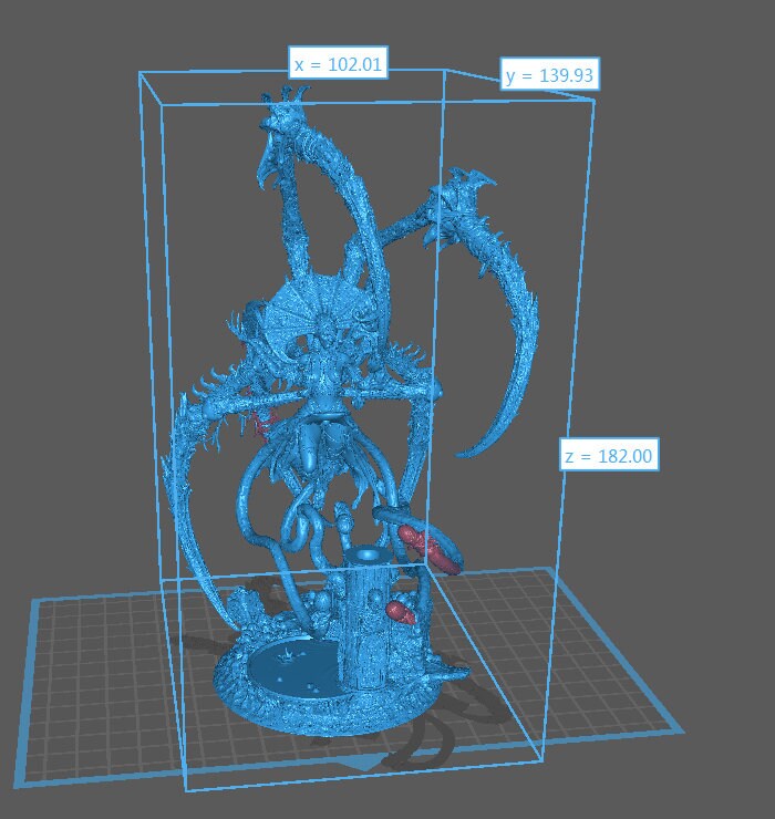 a statue of a demon holding a sword a statue of a demon holding a sword