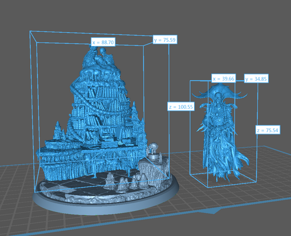 a blue model of a tower with a statue in it