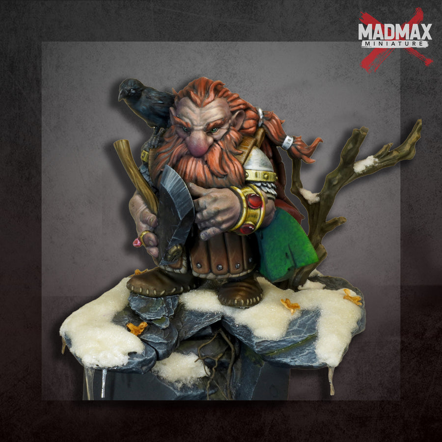 a statue of a troll sitting on top of a rock