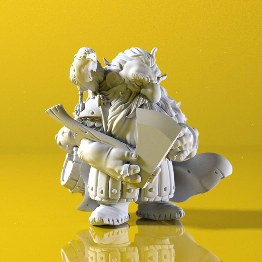 a statue of a troll sitting on top of a rock