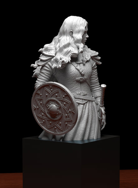 a statue of a woman holding a shield
