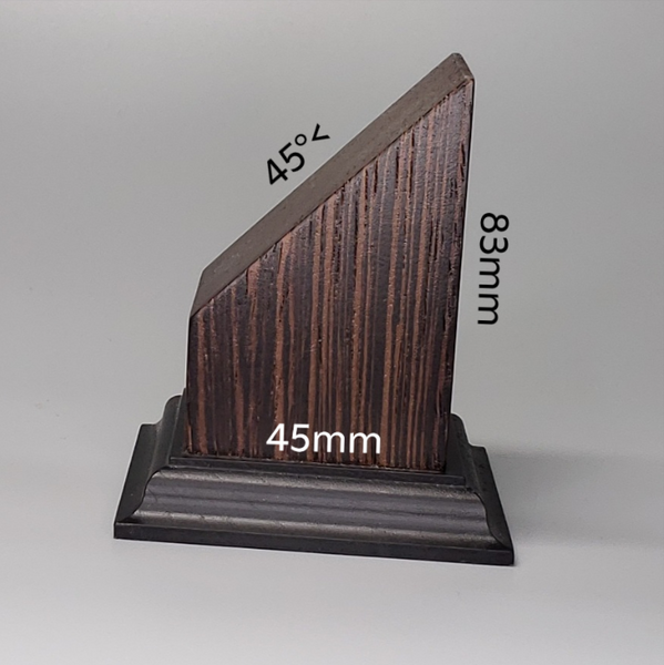 a small wooden object with measurements for it