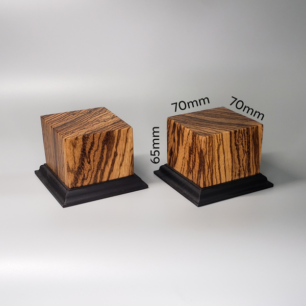a couple of wooden blocks sitting on top of a table