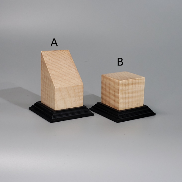 a couple of wooden blocks sitting on top of each other